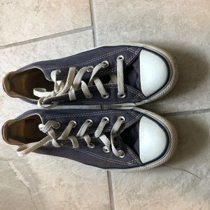Worn navy converses